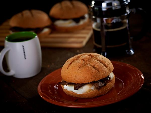 breakfast-tapa-and-egg-with-garlic-mayonnaise-on-dark-whooe-wheat-bread.jpg