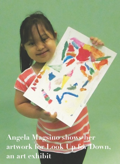 angela-magsino-shows-her-artwork-for-look-up-for-down-an-art-exhibit.jpg